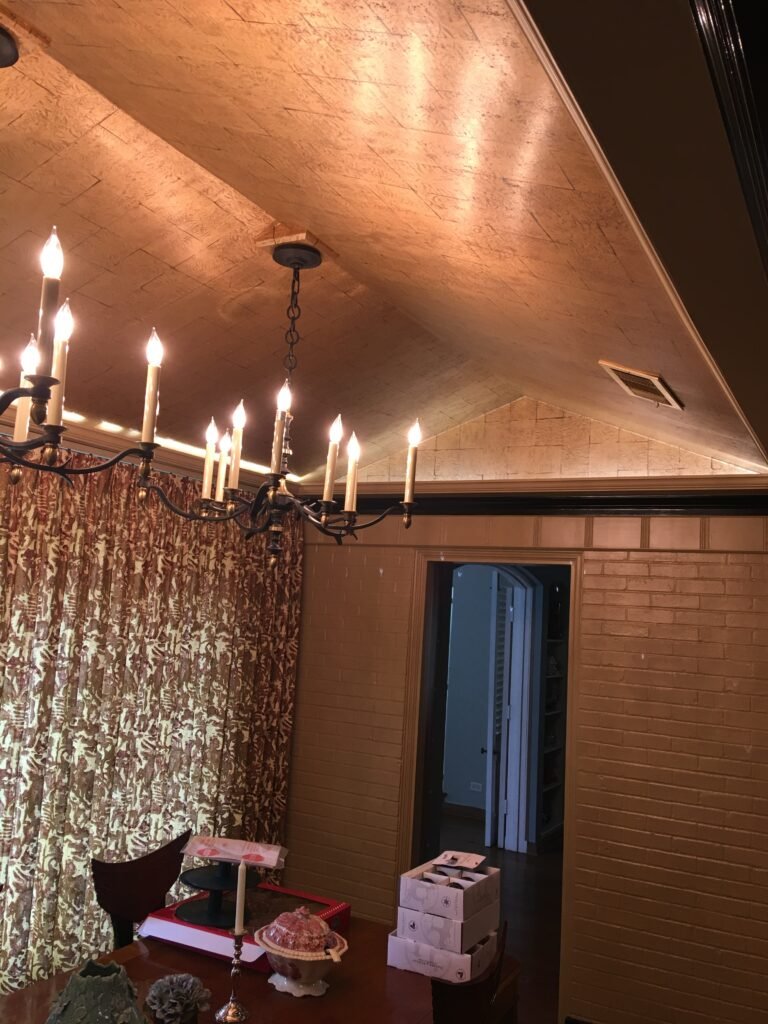 Residential interior featuring a completed wallpaper installation